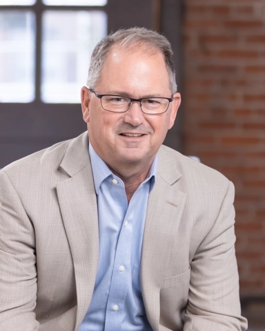 portrait of a smiling person in business attire